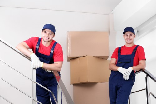 Commercial relocation equipment and furniture arranged for transport
