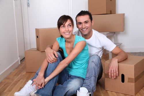 Careful loading of desks and office furniture during relocation