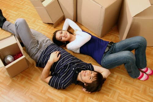 Boxes and furniture being loaded for a local removal service