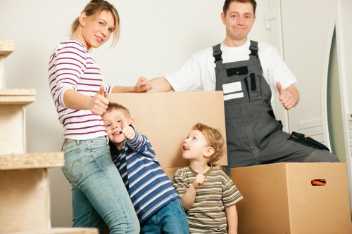 Moving van loading household furniture for a local relocation